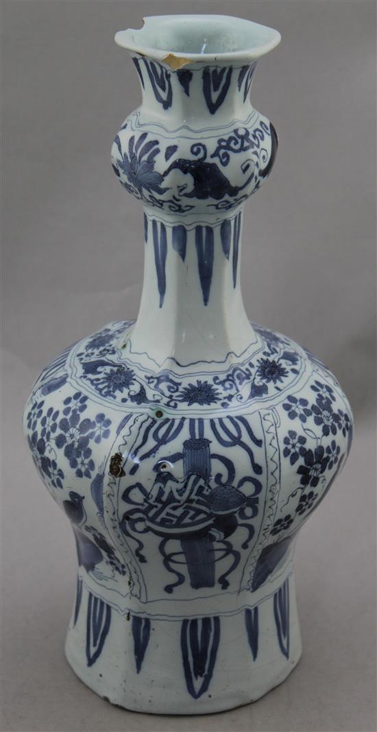 A Delft blue and white bottle vase, c.1700, 32.5cm, drilled and chipped